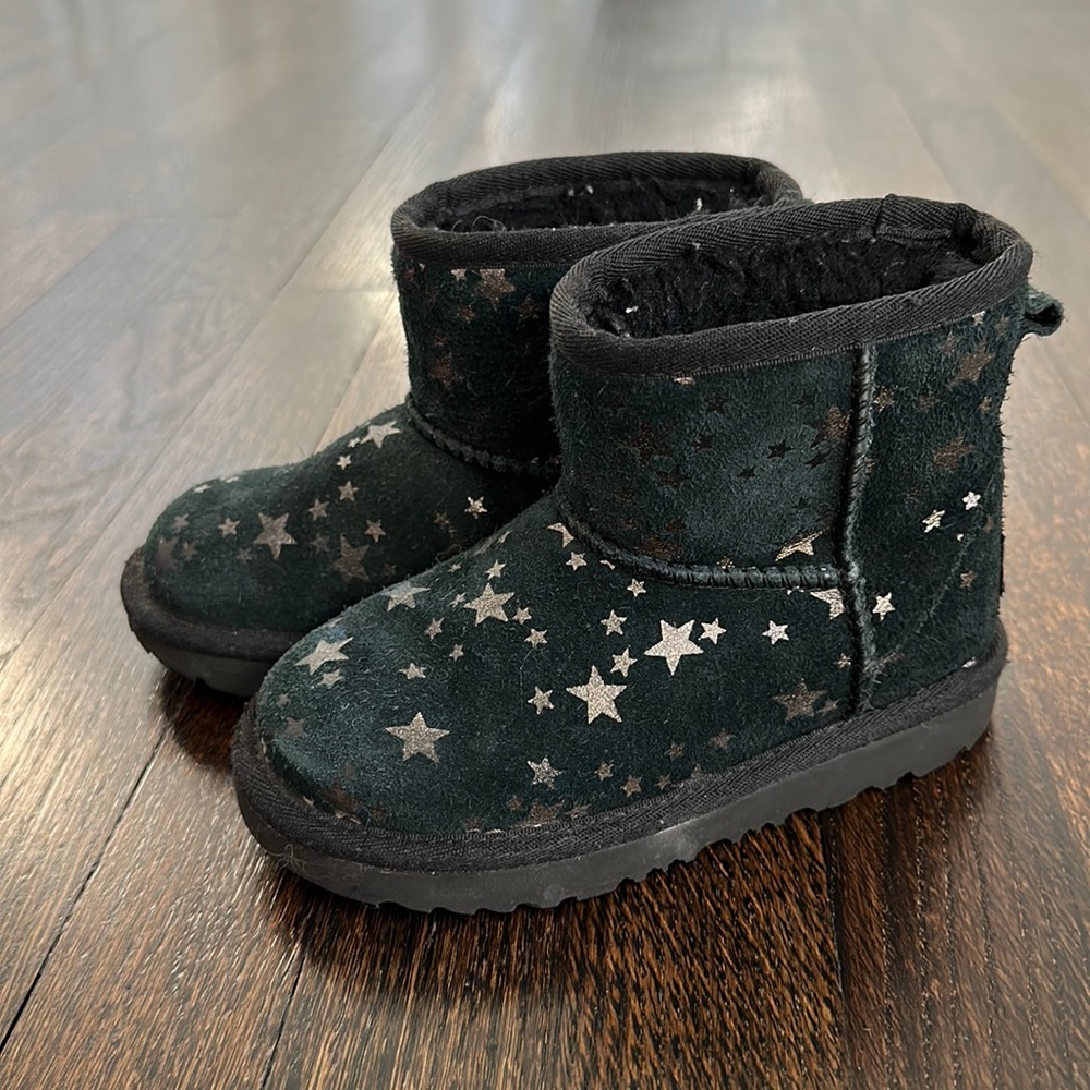 Black uggs with stars- worn but still in good condition